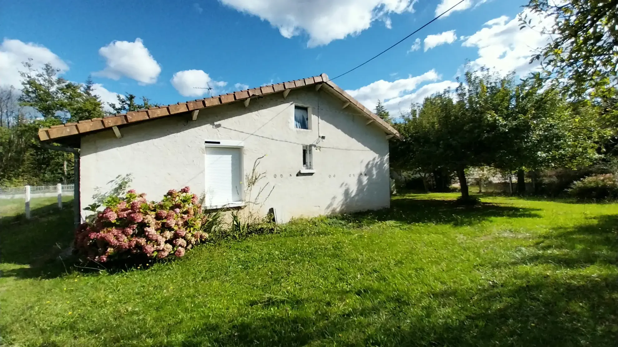 Maison de plain-pied avec 4 chambres, garage et jardin à Ribérac 