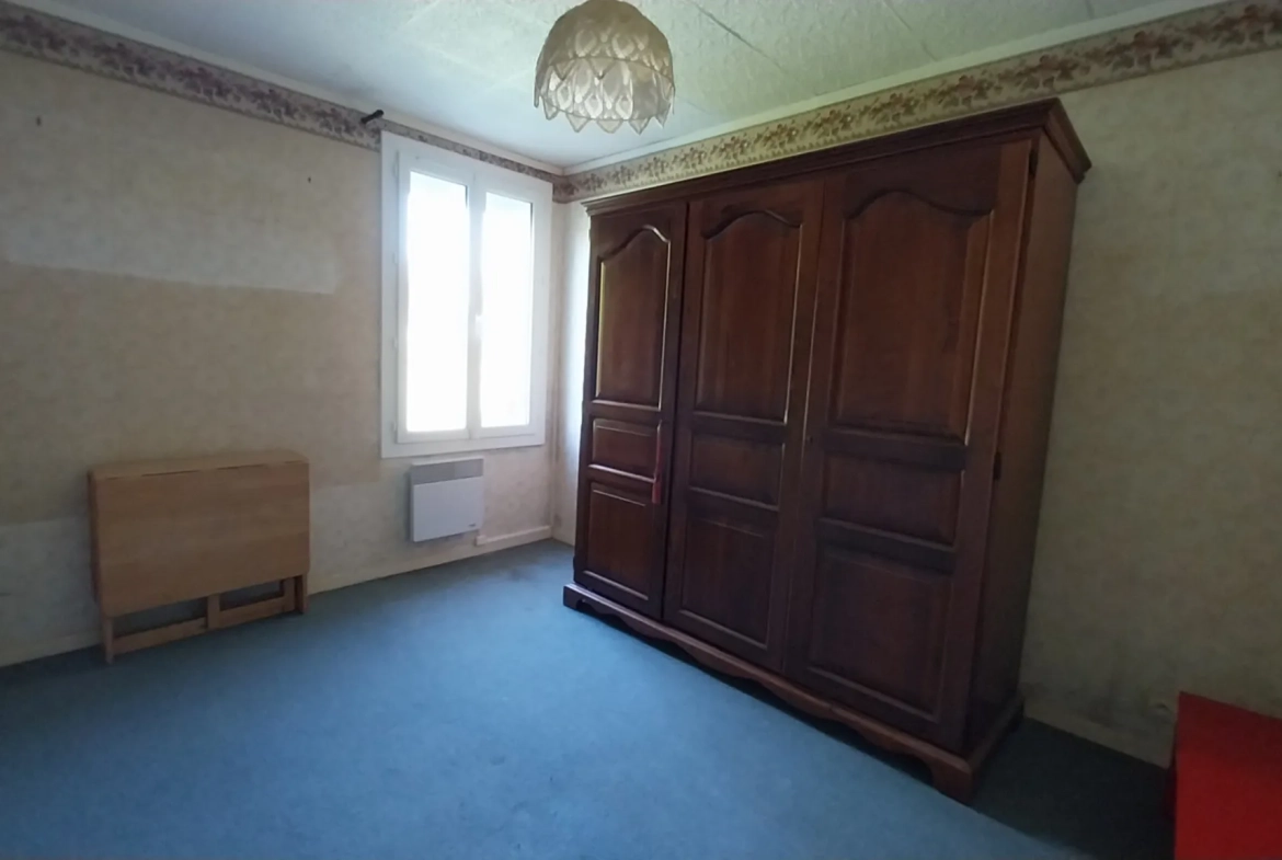 Maison de plain-pied avec 4 chambres, garage et jardin à Ribérac 