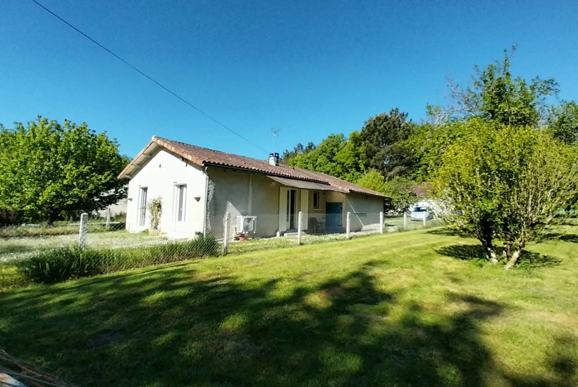Maison de plain-pied avec 4 chambres, garage et jardin à Ribérac 
