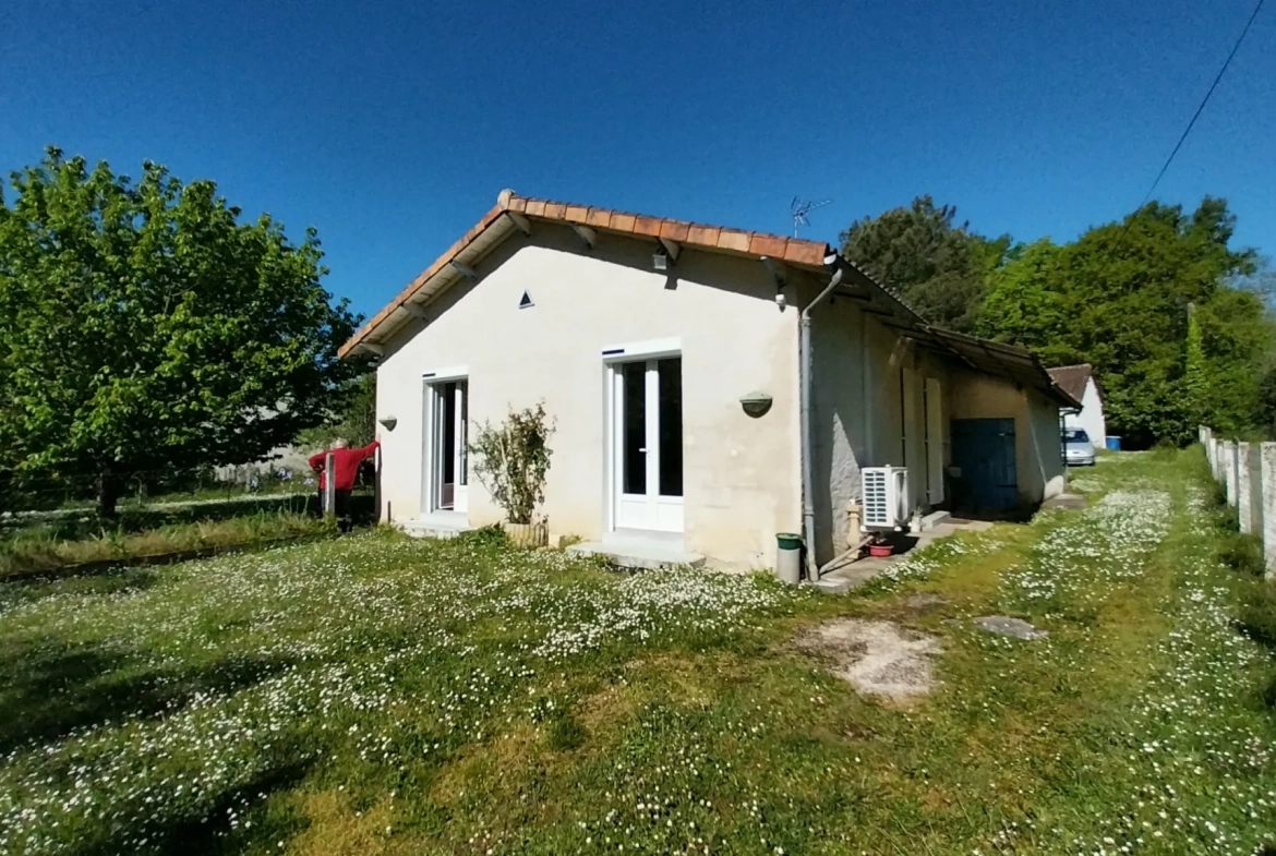 Maison de plain-pied avec 4 chambres, garage et jardin à Ribérac 