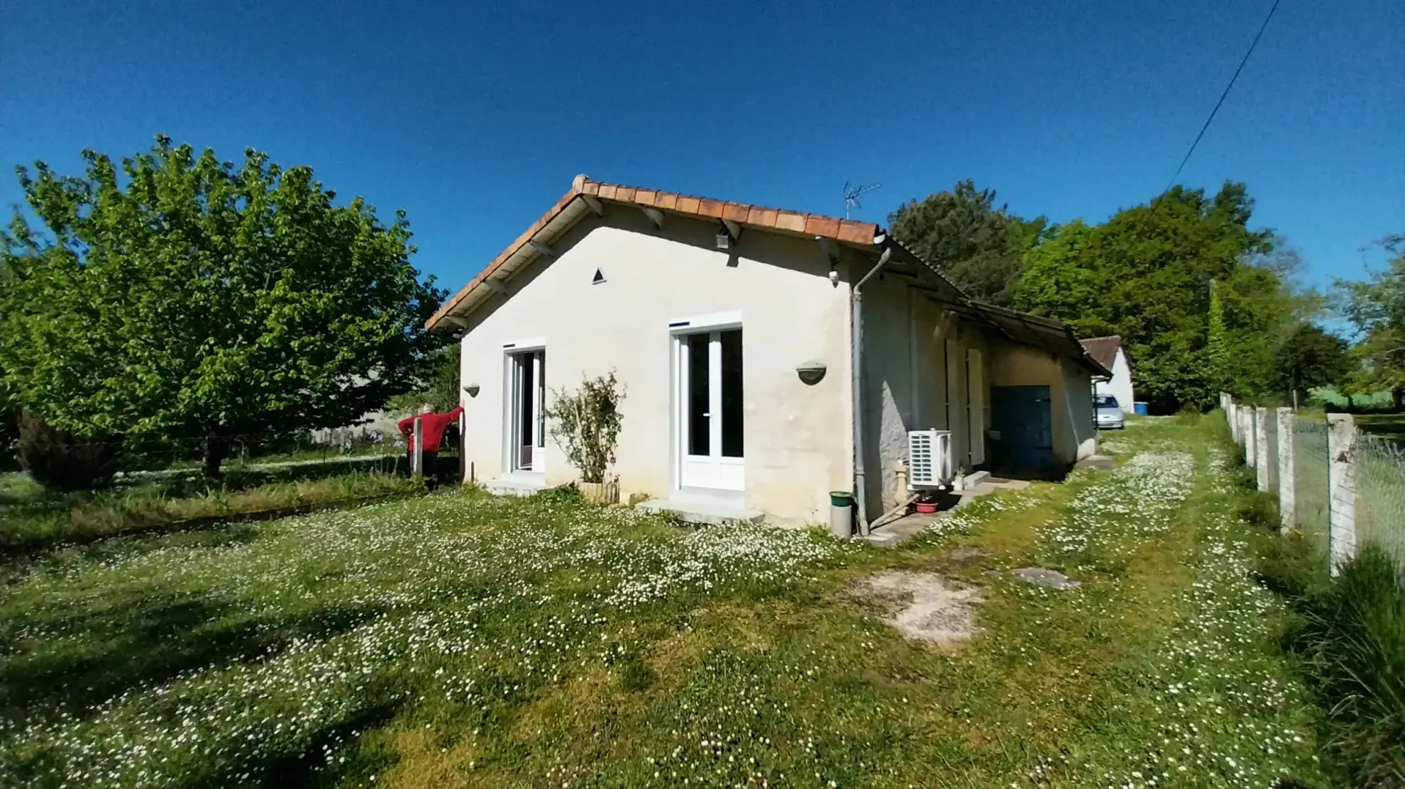 Maison de plain-pied avec 4 chambres, garage et jardin à Ribérac 