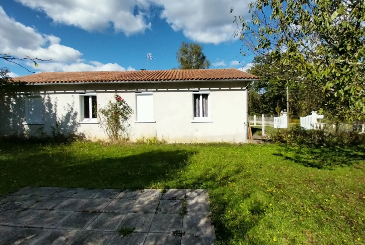 Maison de plain-pied avec 4 chambres, garage et jardin à Ribérac 
