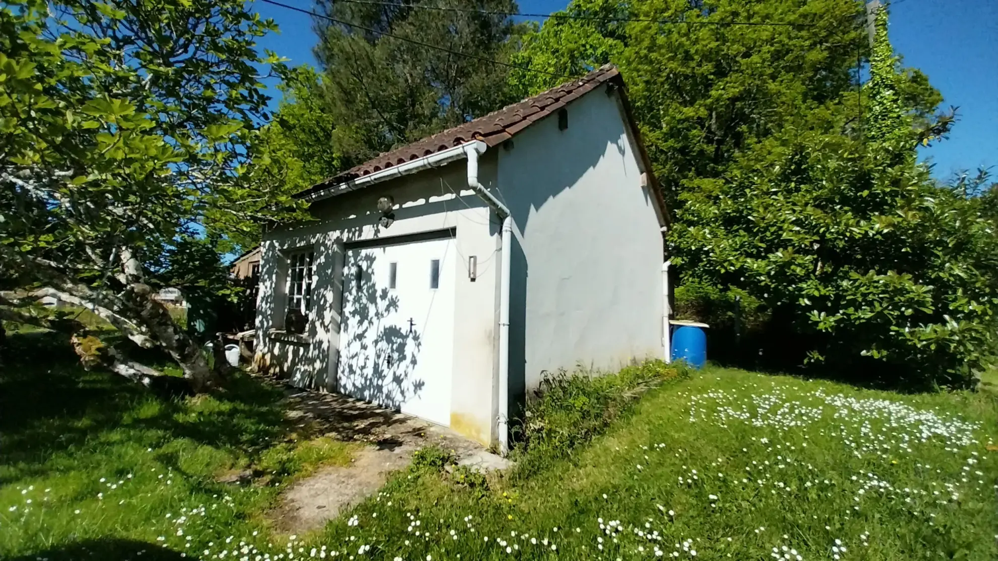 Maison de plain-pied avec 4 chambres, garage et jardin à Ribérac 