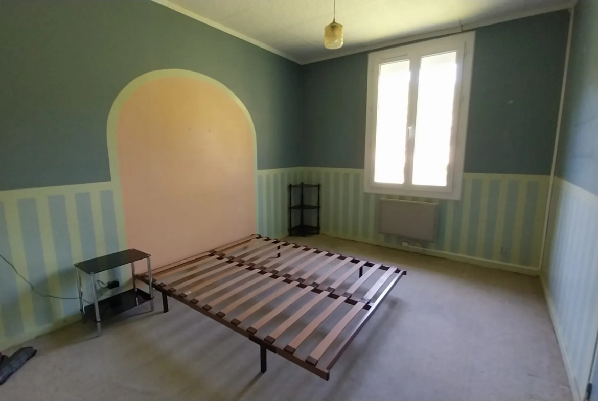 Maison de plain-pied avec 4 chambres, garage et jardin à Ribérac 
