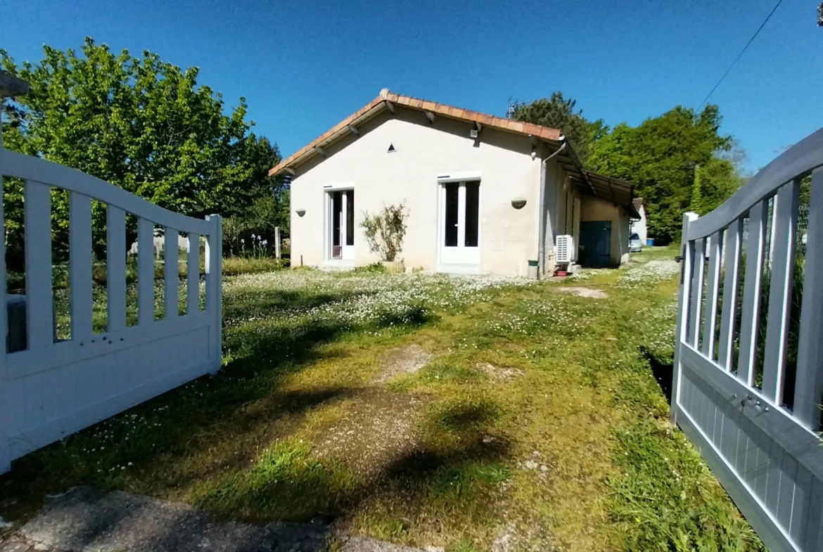 Maison de plain-pied avec 4 chambres, garage et jardin à Ribérac 