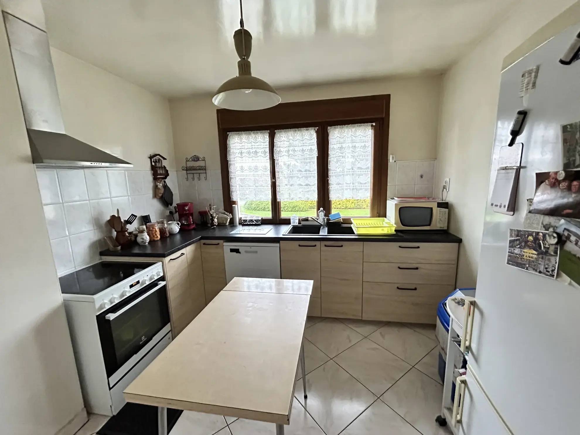 Maison lumineuse à vendre à Augny avec grand terrain et garage, proximité Metz 