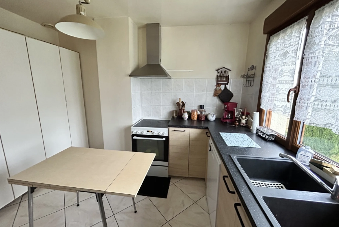 Maison lumineuse à vendre à Augny avec grand terrain et garage, proximité Metz 