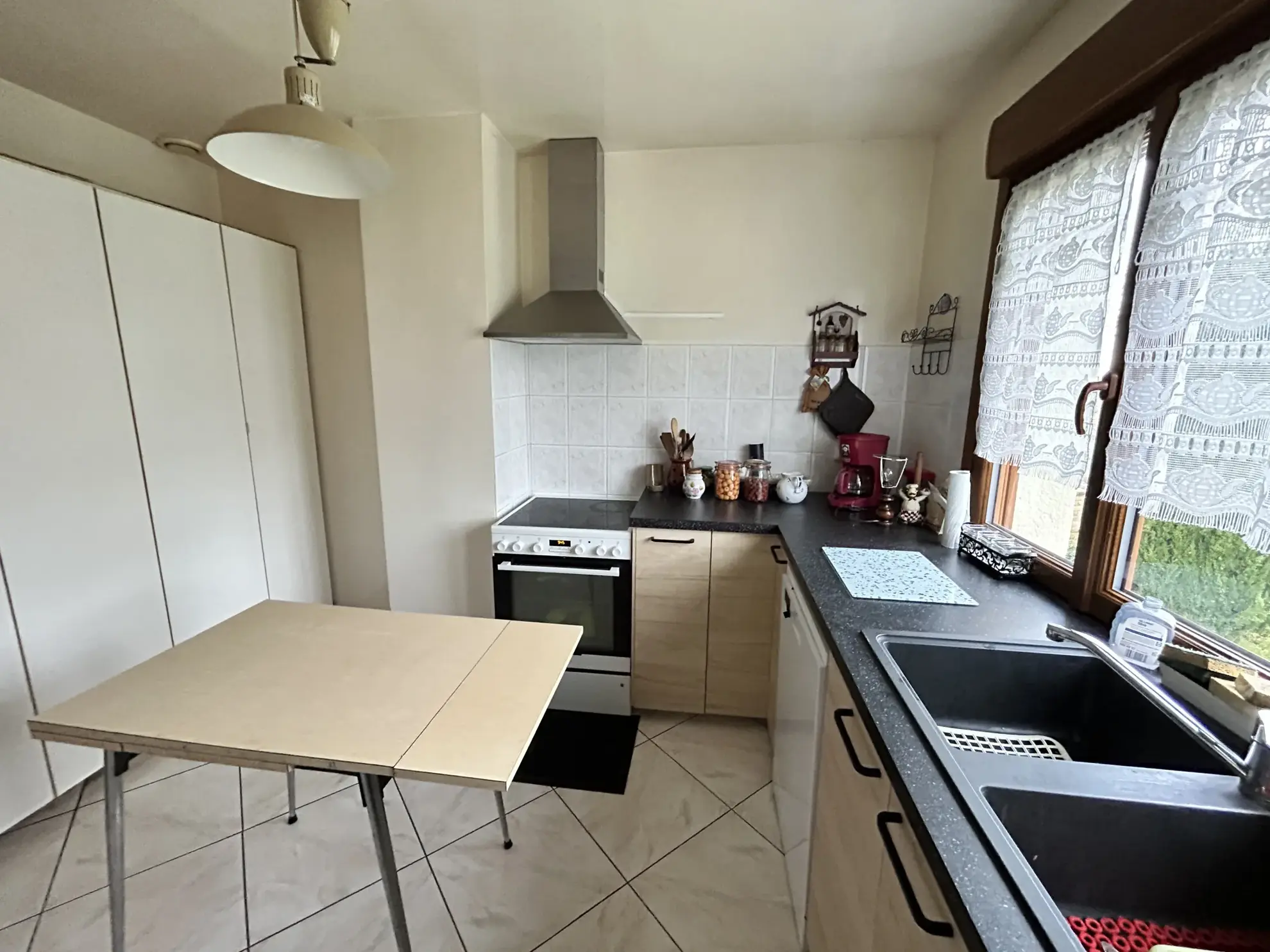 Maison lumineuse à vendre à Augny avec grand terrain et garage, proximité Metz 