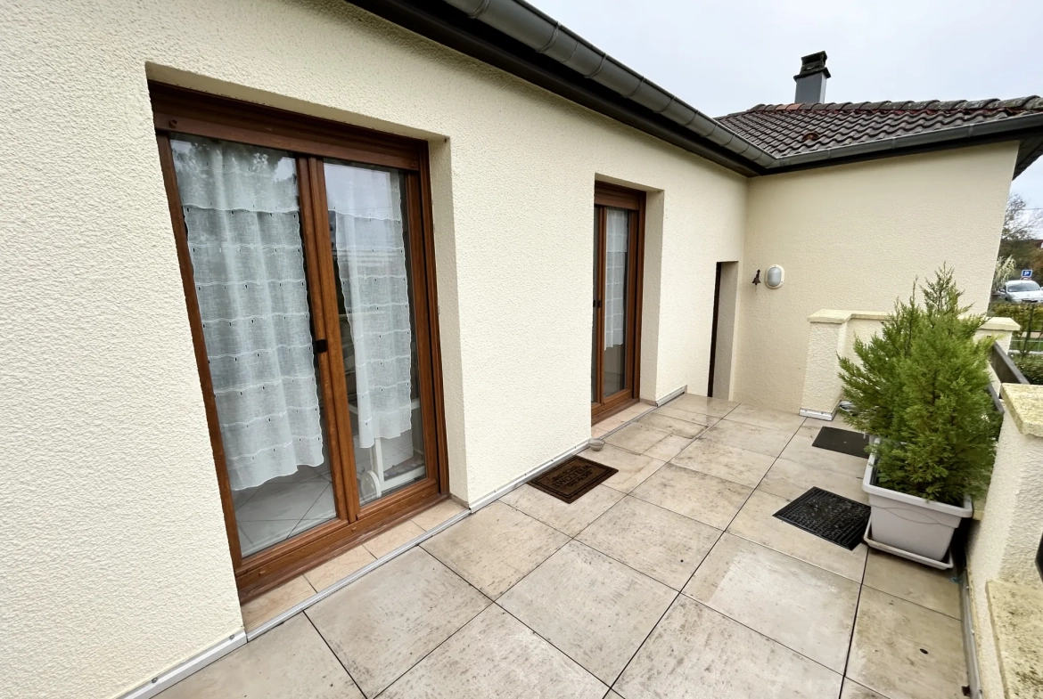 Maison lumineuse à vendre à Augny avec grand terrain et garage, proximité Metz 