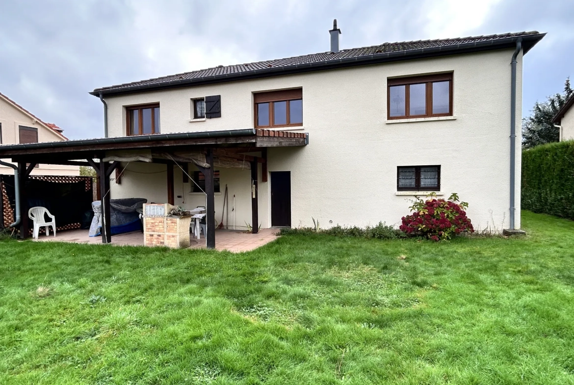 Maison lumineuse à vendre à Augny avec grand terrain et garage, proximité Metz 