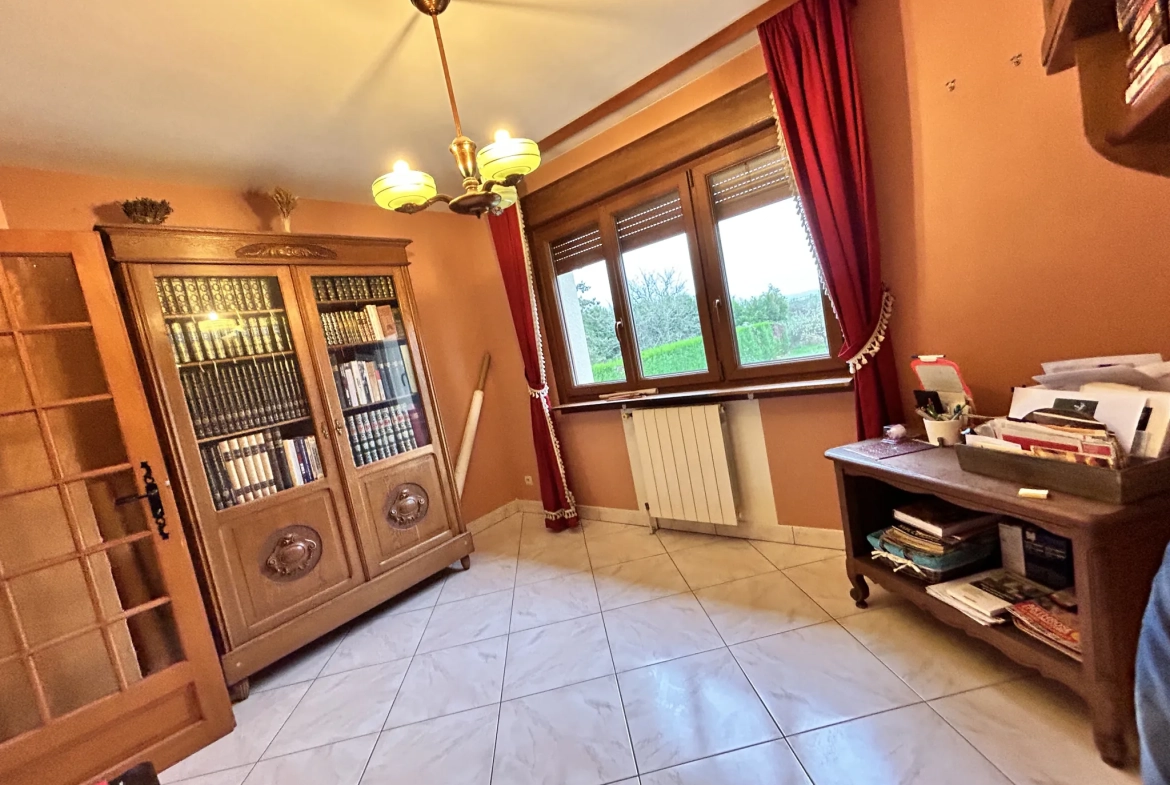 Maison lumineuse à vendre à Augny avec grand terrain et garage, proximité Metz 