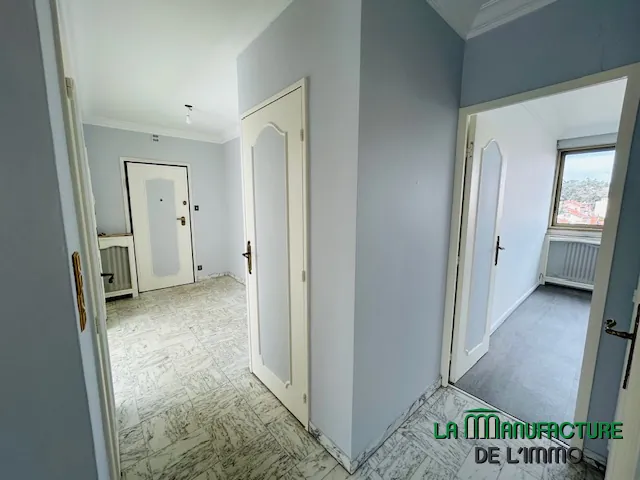 Appartement T3/T4 rénové avec balcon et cave à Saint-Étienne, secteur Carnot 