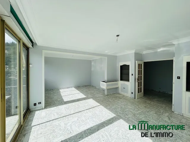 Appartement T3/T4 rénové avec balcon et cave à Saint-Étienne, secteur Carnot 