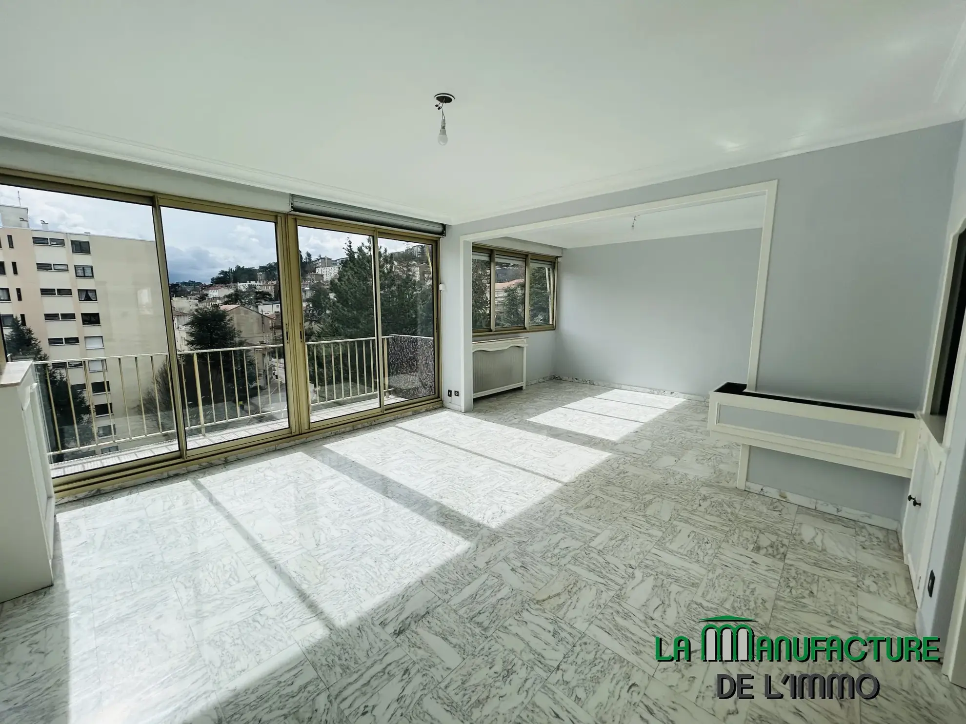 Appartement T3/T4 rénové avec balcon et cave à Saint-Étienne, secteur Carnot 