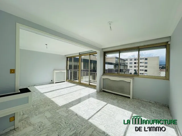Appartement T3/T4 rénové avec balcon et cave à Saint-Étienne, secteur Carnot 