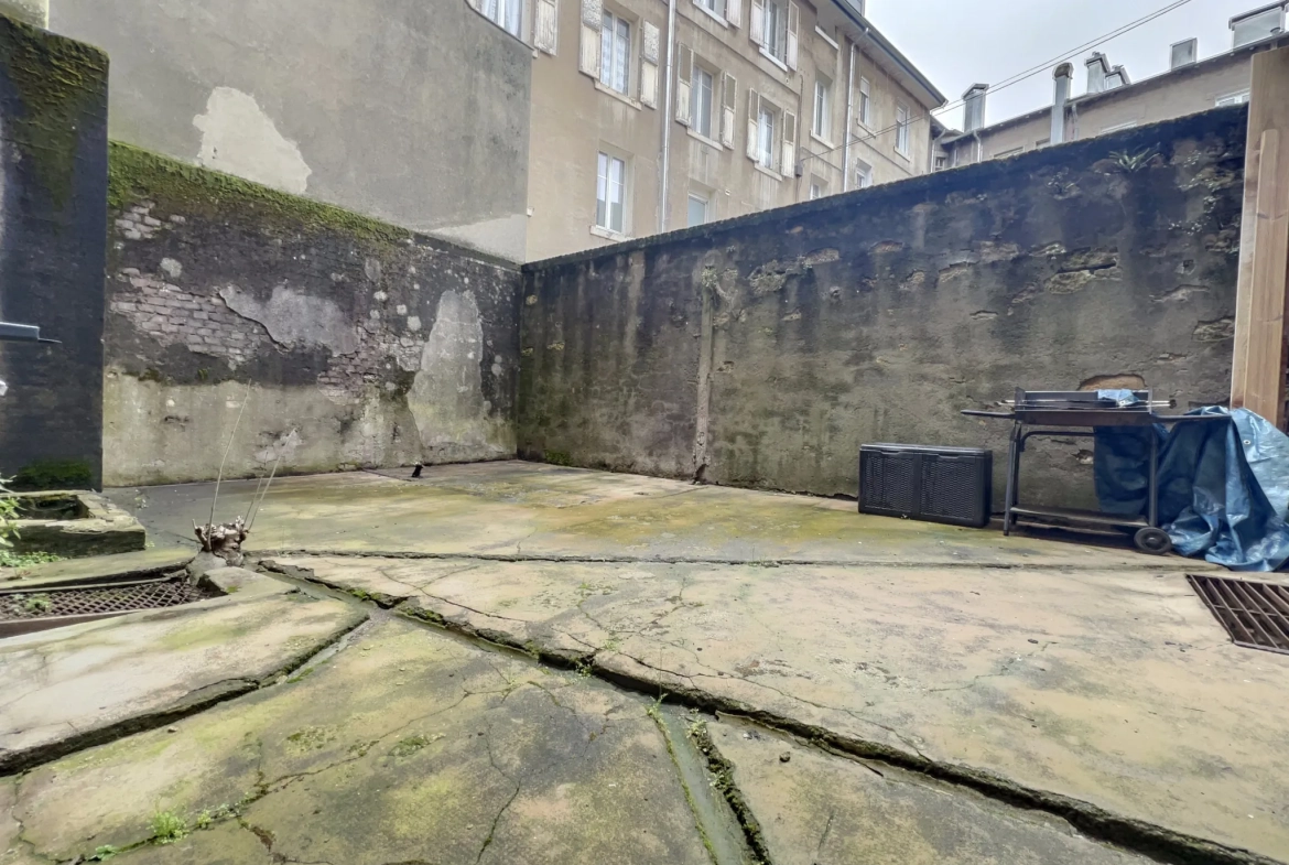 Appartement rénové à Longwy proche gare avec parking et options d'extension 