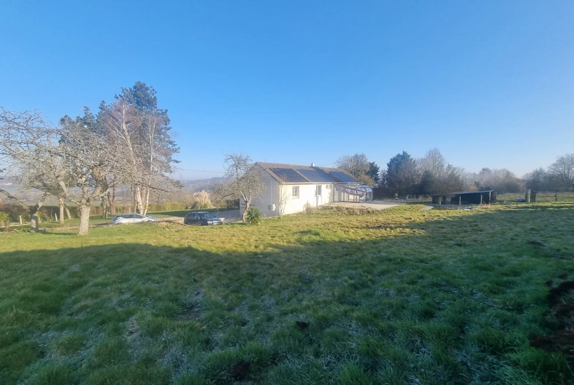 Maison de plain-pied à Mêle-sur-Sarthe avec grand terrain et dépendances 