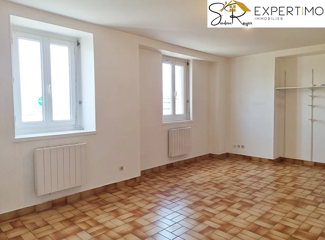Maison avec deux appartements, atelier et grand terrain à Saint-Éloy-les-Mines 