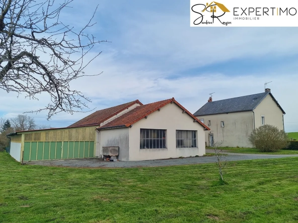 Maison avec deux appartements, atelier et grand terrain à Saint-Éloy-les-Mines