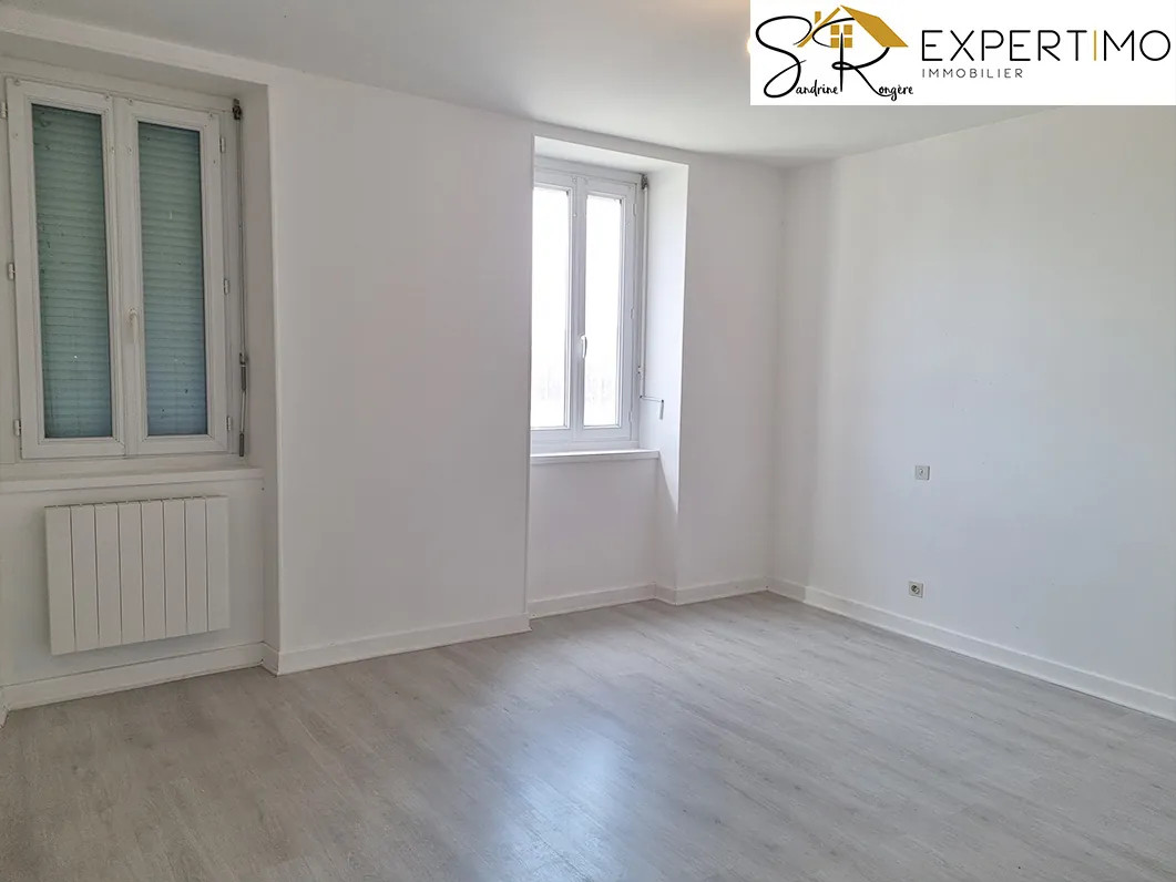 Maison avec deux appartements, atelier et grand terrain à Saint-Éloy-les-Mines 