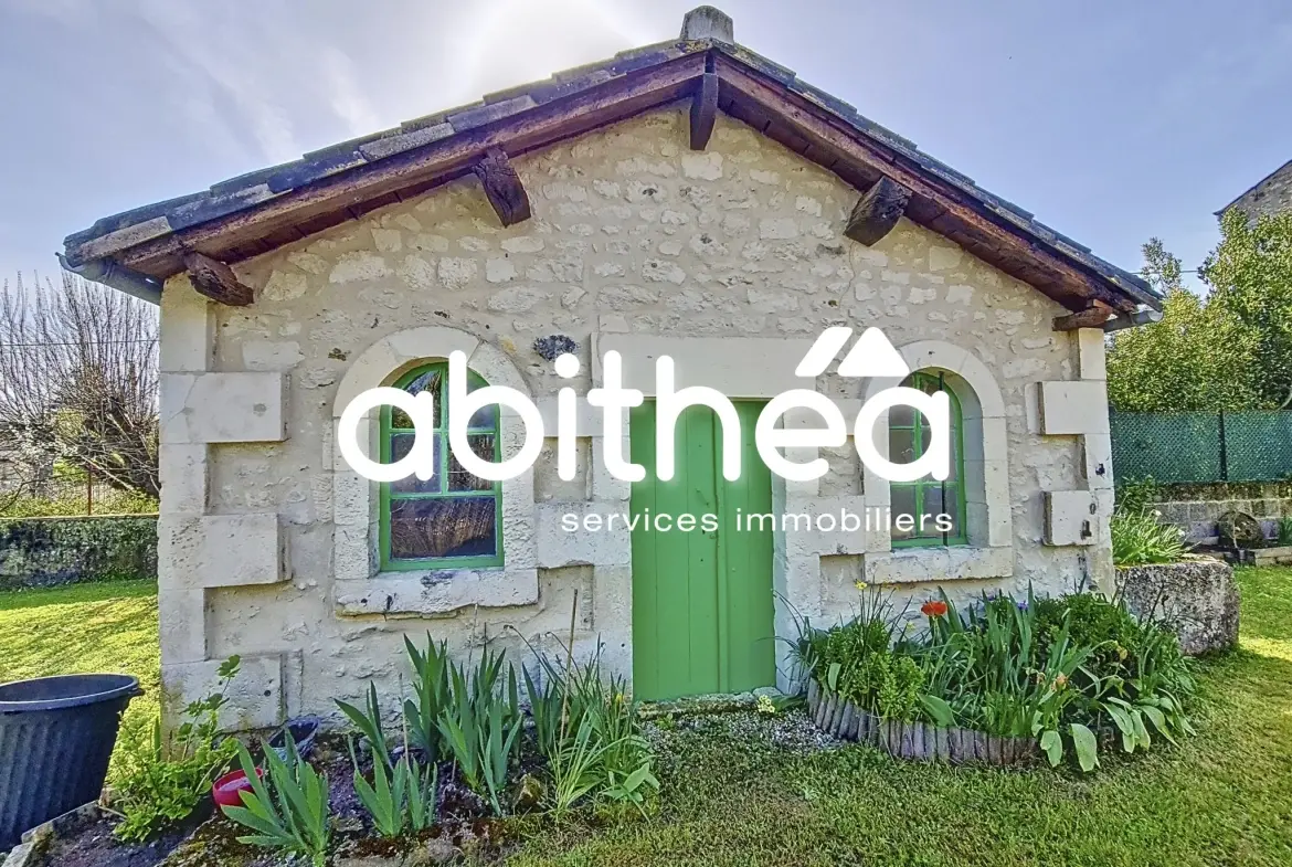 Maison ancienne de 140 m² avec jardin et garage à Saint-Fort sur Gironde 