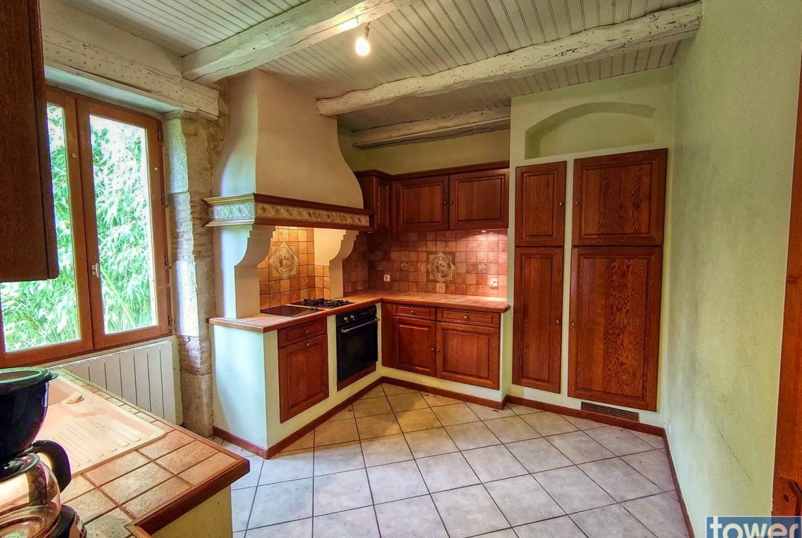 Charmante maison en pierre avec terrain fruitier à Boissières, proche Cahors 