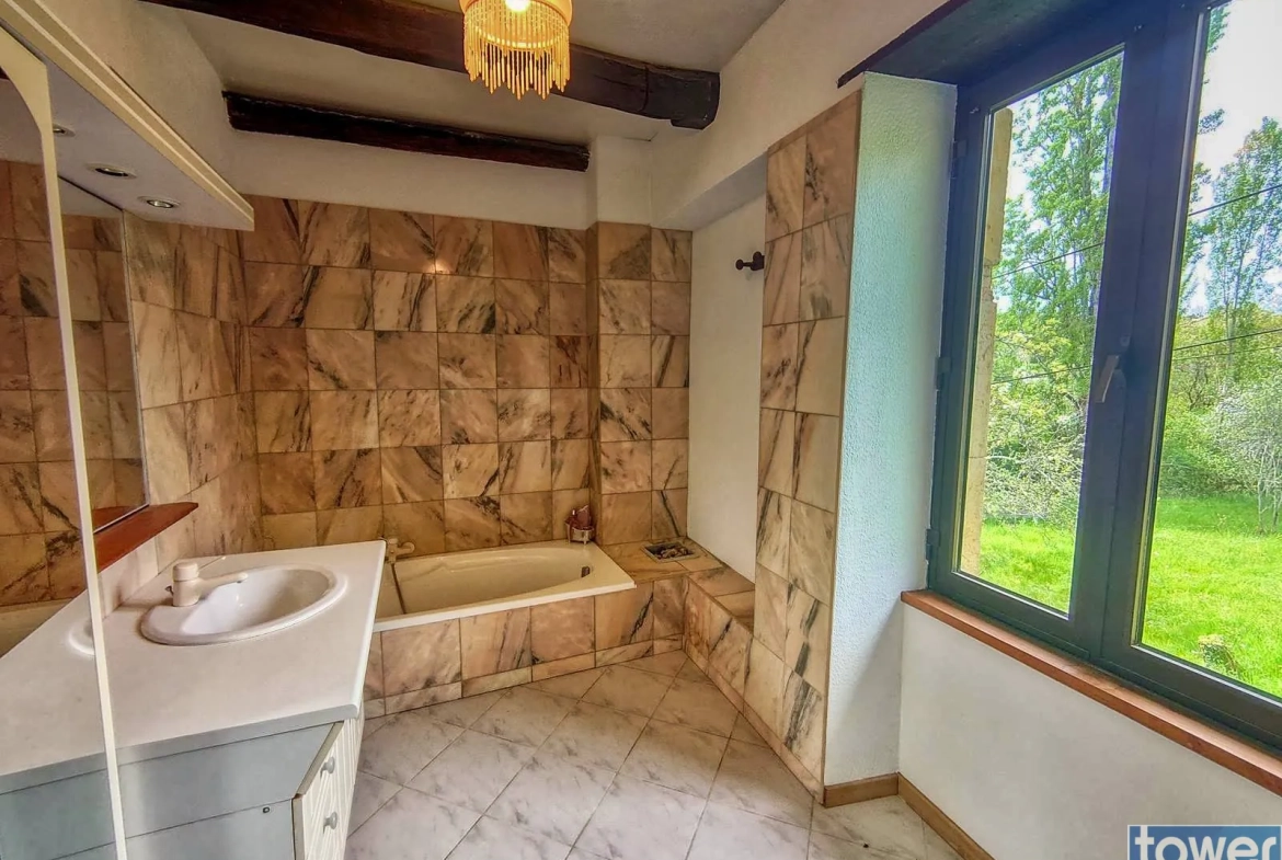 Charmante maison en pierre avec terrain fruitier à Boissières, proche Cahors 