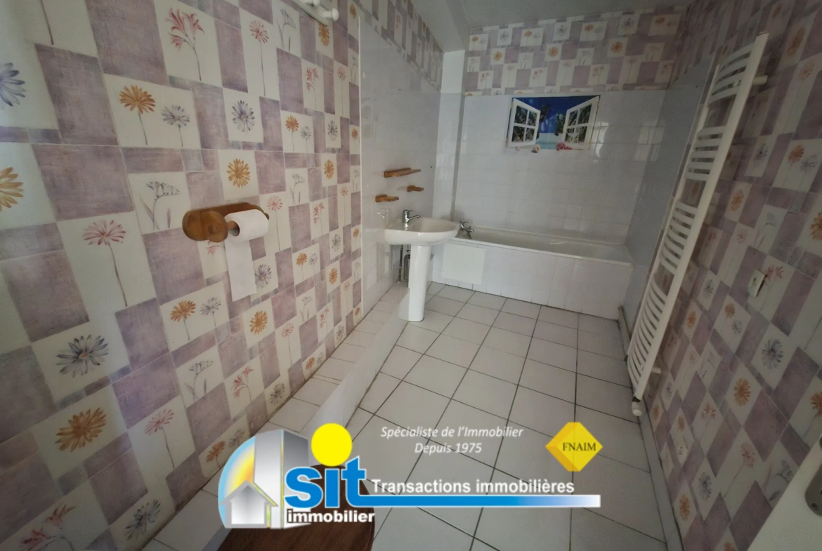 Maison de ville avec garage à Condrieu – 80 m², 2 chambres, secteur calme 