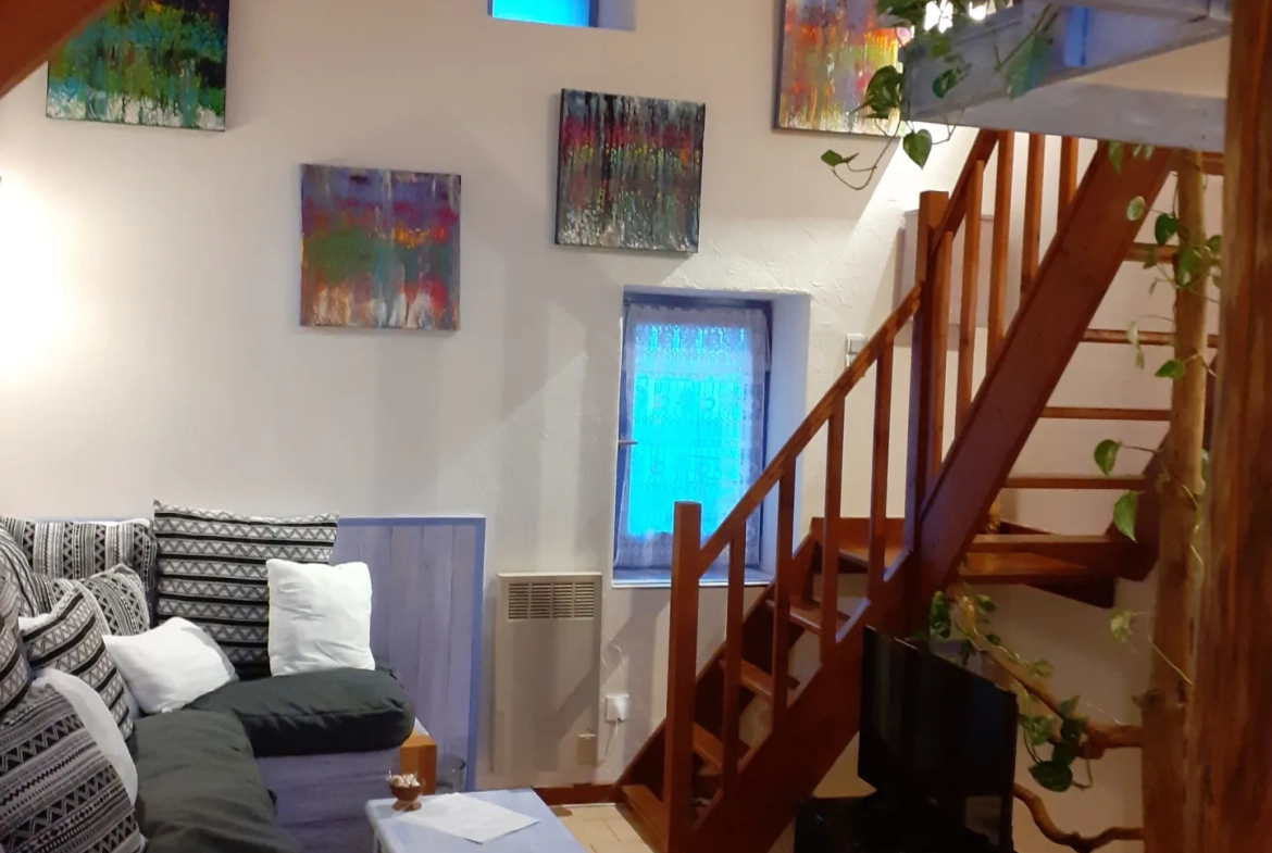 Maison duplex avec deux habitations, terrasse et jardinet au Bousquet d'Orb 