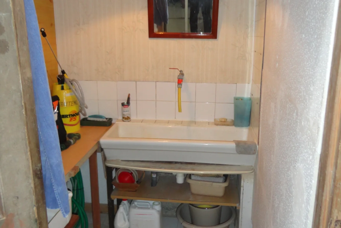À vendre maison de 170 m² au cœur de Saint Jean d'Angély avec 5 chambres et cave 