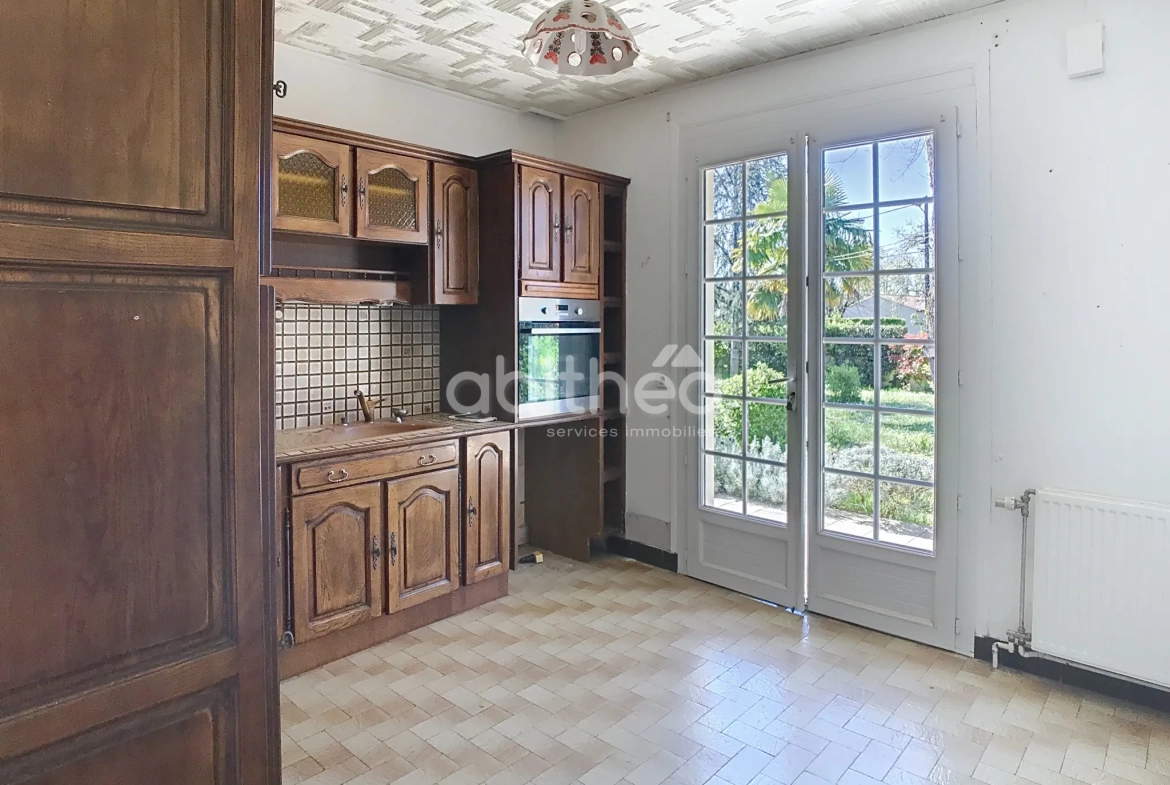 Maison de plain-pied à vendre à Puymoyen avec jardin et garage 