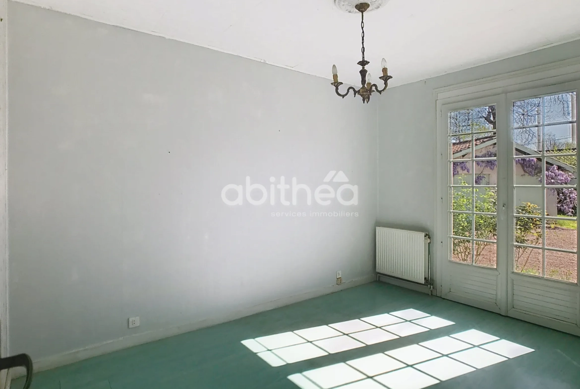 Maison de plain-pied à vendre à Puymoyen avec jardin et garage 