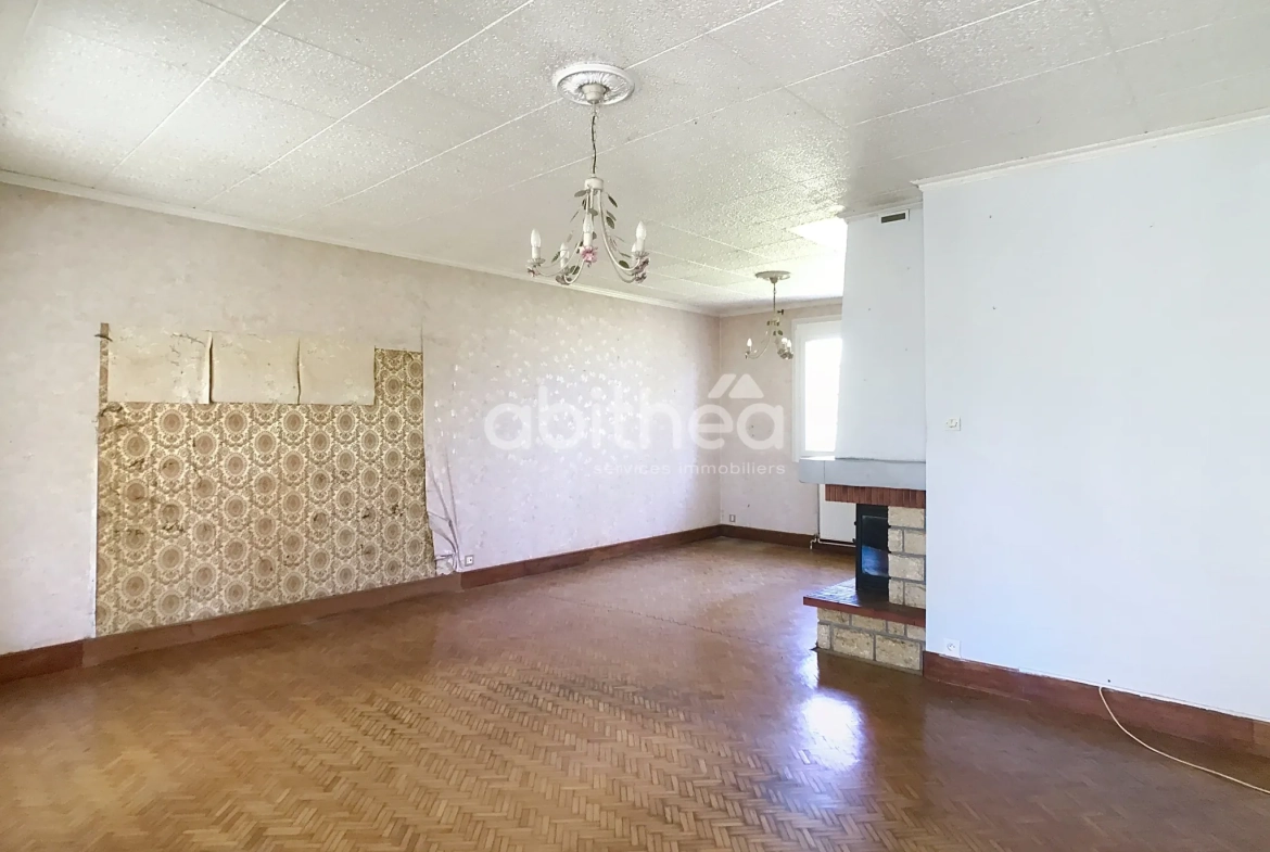 Maison de plain-pied à vendre à Puymoyen avec jardin et garage 