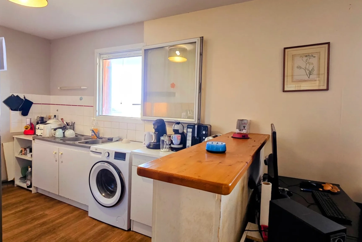 Appartement T3 à Malemort-sur-Corrèze avec terrasse et garage, bon état 