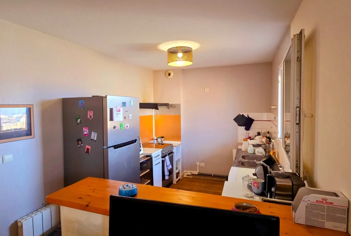 Appartement T3 à Malemort-sur-Corrèze avec terrasse et garage, bon état 