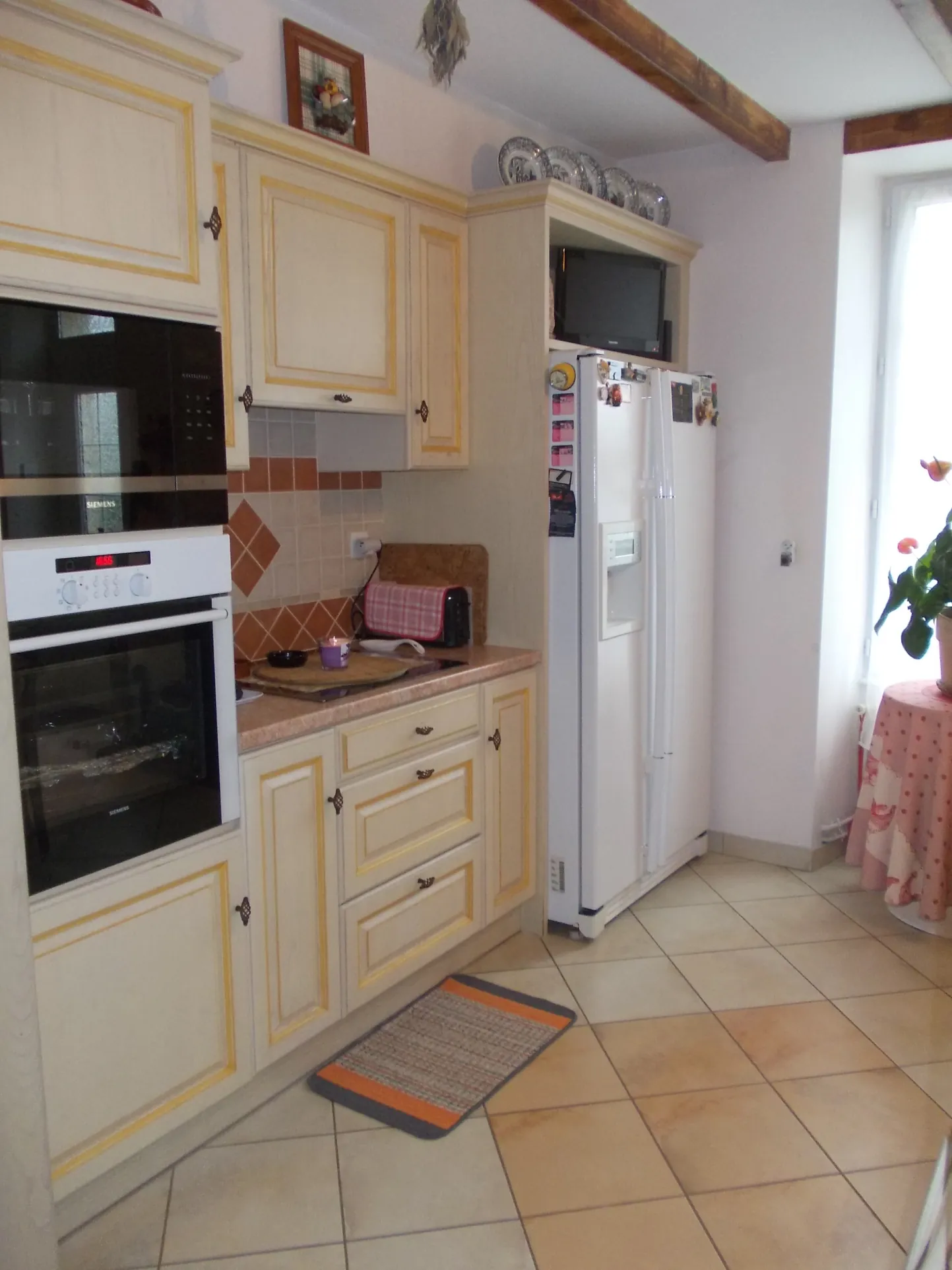 Maison charentaise à Jonzac de 121 m² avec terrain arboré et rénovation récente 