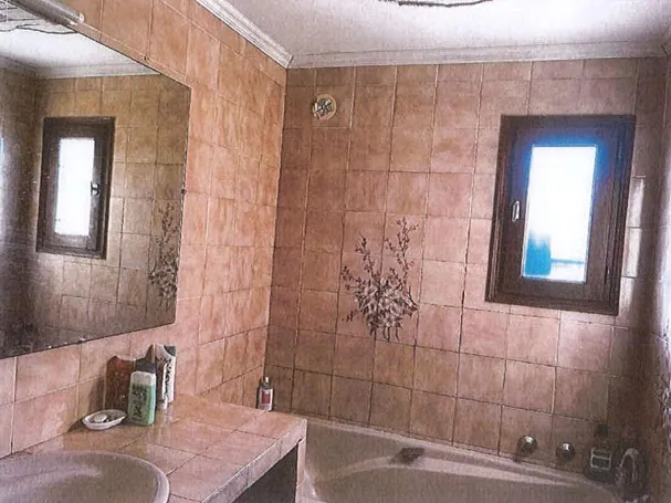 Vente aux enchères d'une maison T4 avec terrasse à Lumio 