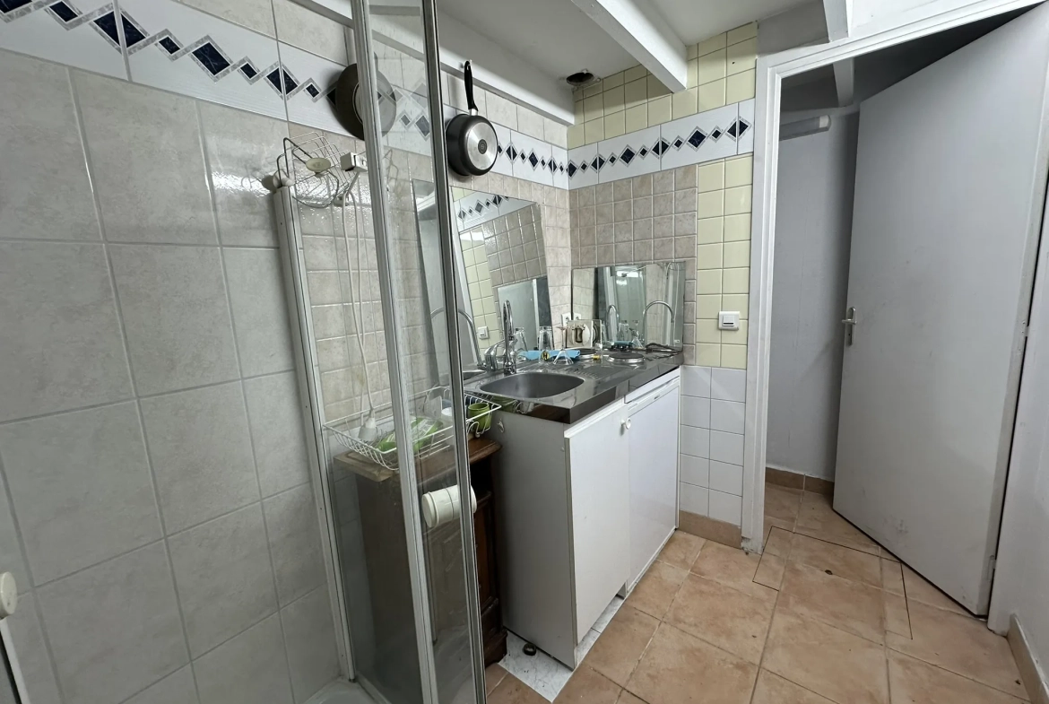 Investissement immobilier à Tourcoing : immeuble avec local commercial et appartements 