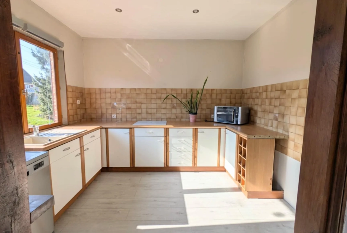 Maison de village de 91,5 m² avec terrain arboré à Thenailes, proche Vervins 