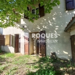 Maison mitoyenne à La Couvertoirade avec jardin et potentiel de rénovation