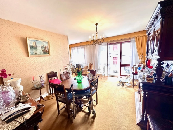 Appartement T3 à Lourdes avec garage, cave et potentiel de rénovation proche des halles