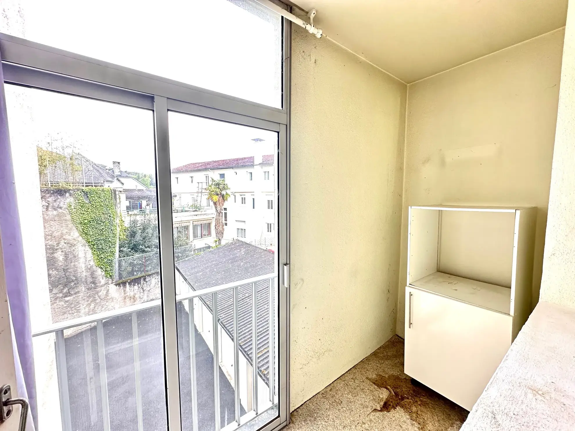 Appartement T3 à Lourdes avec garage, cave et potentiel de rénovation proche des halles 