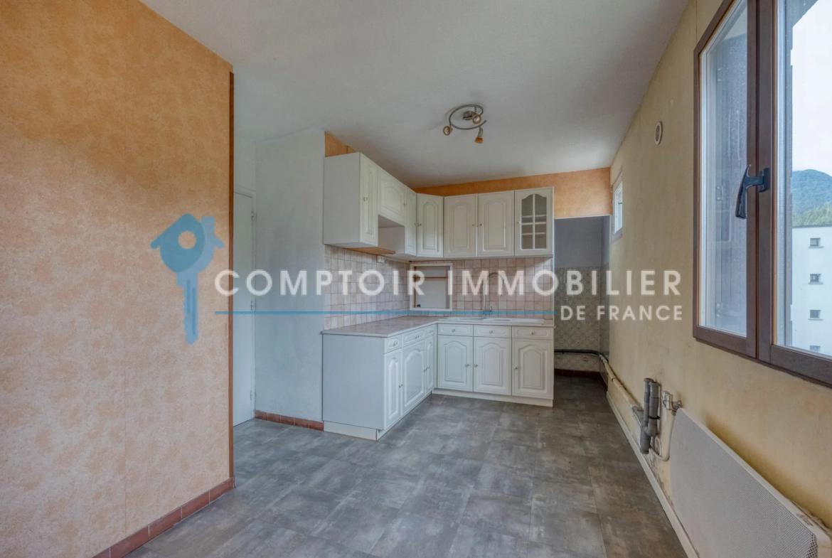 Appartement T4 de 79 m² à Vizille avec balcon, parking et cave, secteur recherché 