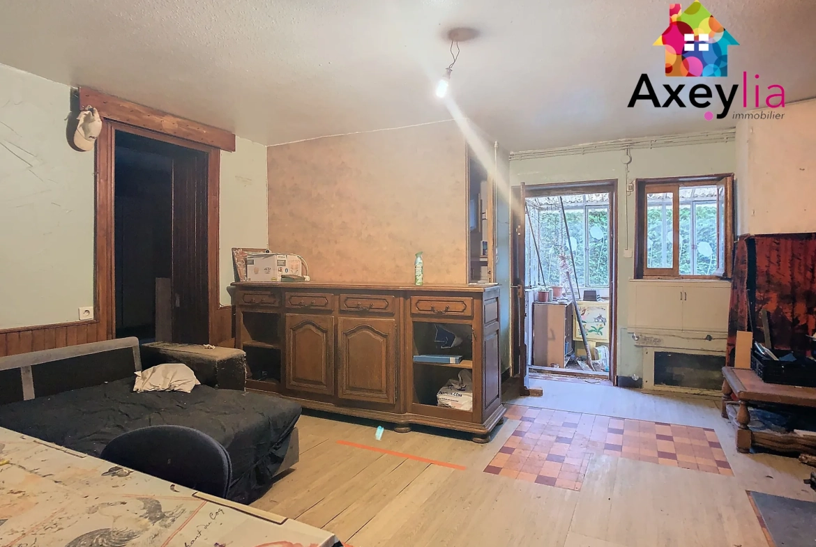 Maison à rénover à Curdin avec terrain de 950 m² - Opportunité à saisir 