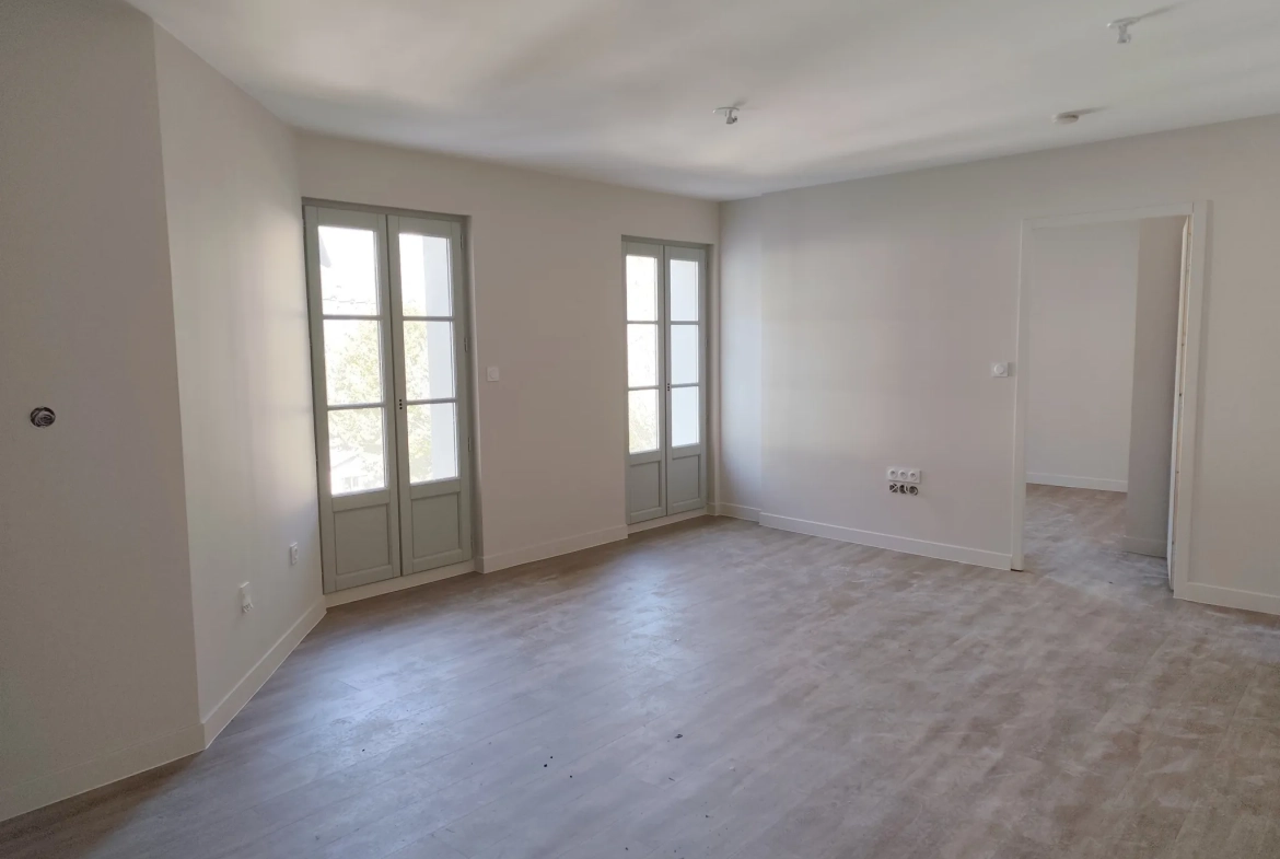 Appartement 52 m² en centre-ville de Bagnères de Luchon avec terrasse et cave 