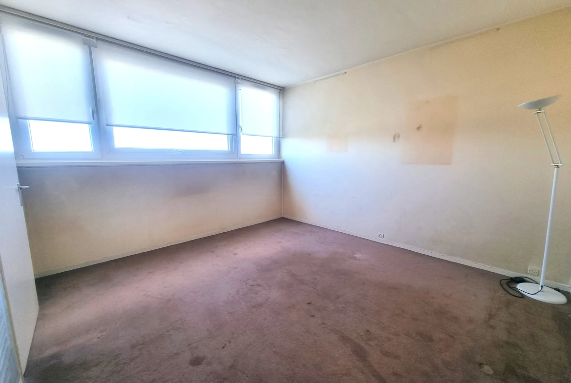 Appartement T4 à Lille Parc Saint-Maur avec garage, cave et loggia 