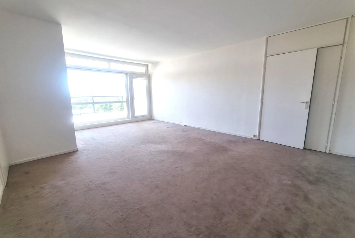 Appartement T4 à Lille Parc Saint-Maur avec garage, cave et loggia 