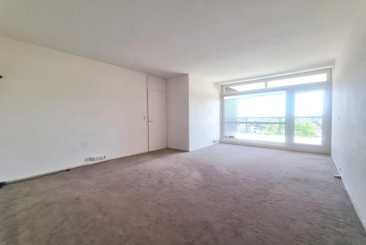 Appartement T4 à Lille Parc Saint-Maur avec garage, cave et loggia 