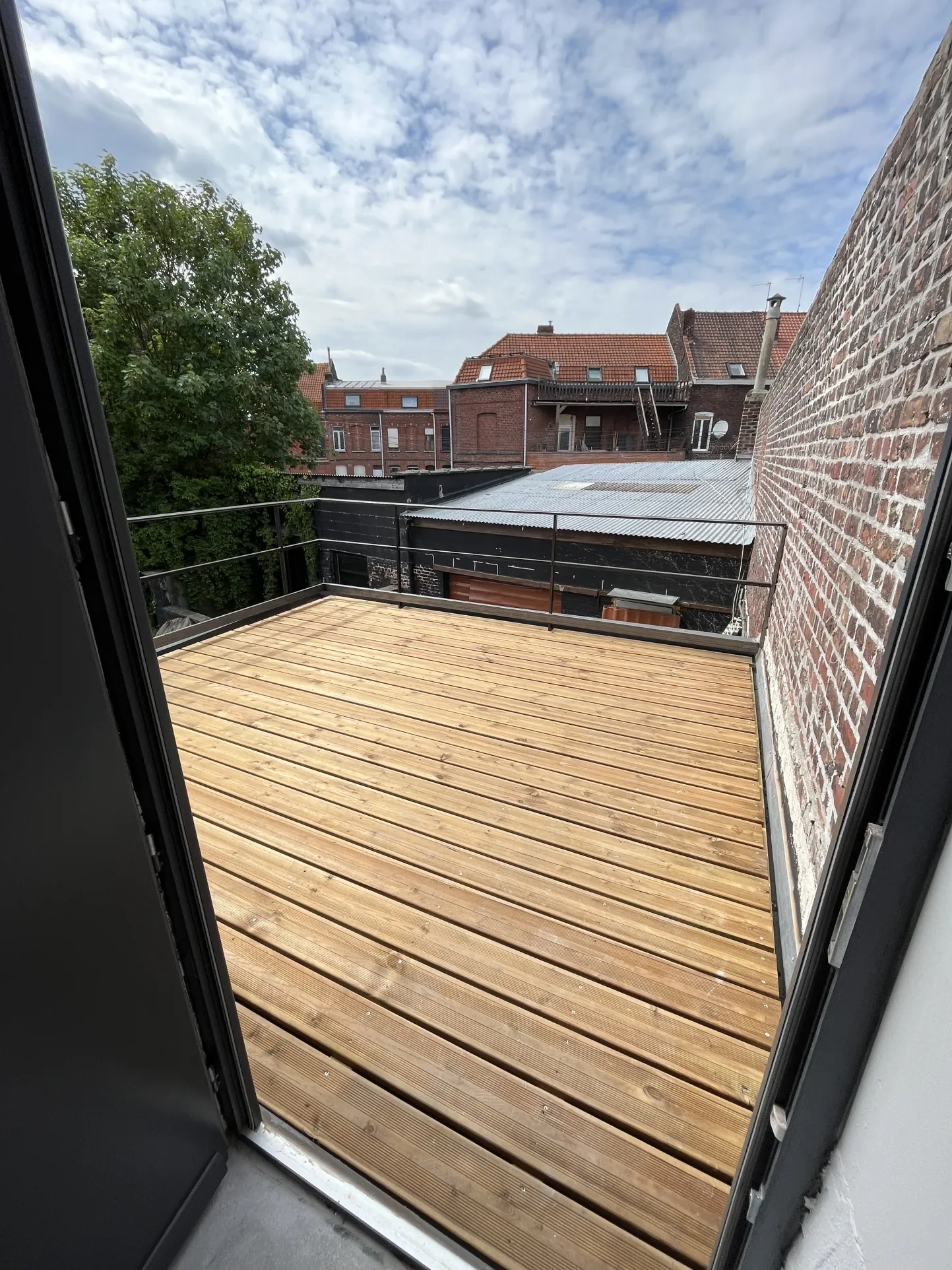 Loft individuel de 70 m² avec jardin et terrasse suspendue à Tourcoing 