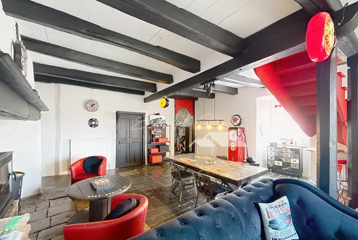 Maison de village à Paulhe avec grand garage, rénovation récente et authenticité assurée 